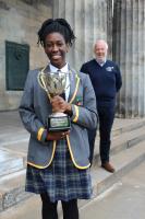 Toluwani Idowu receives her trophy from President Clive Murray